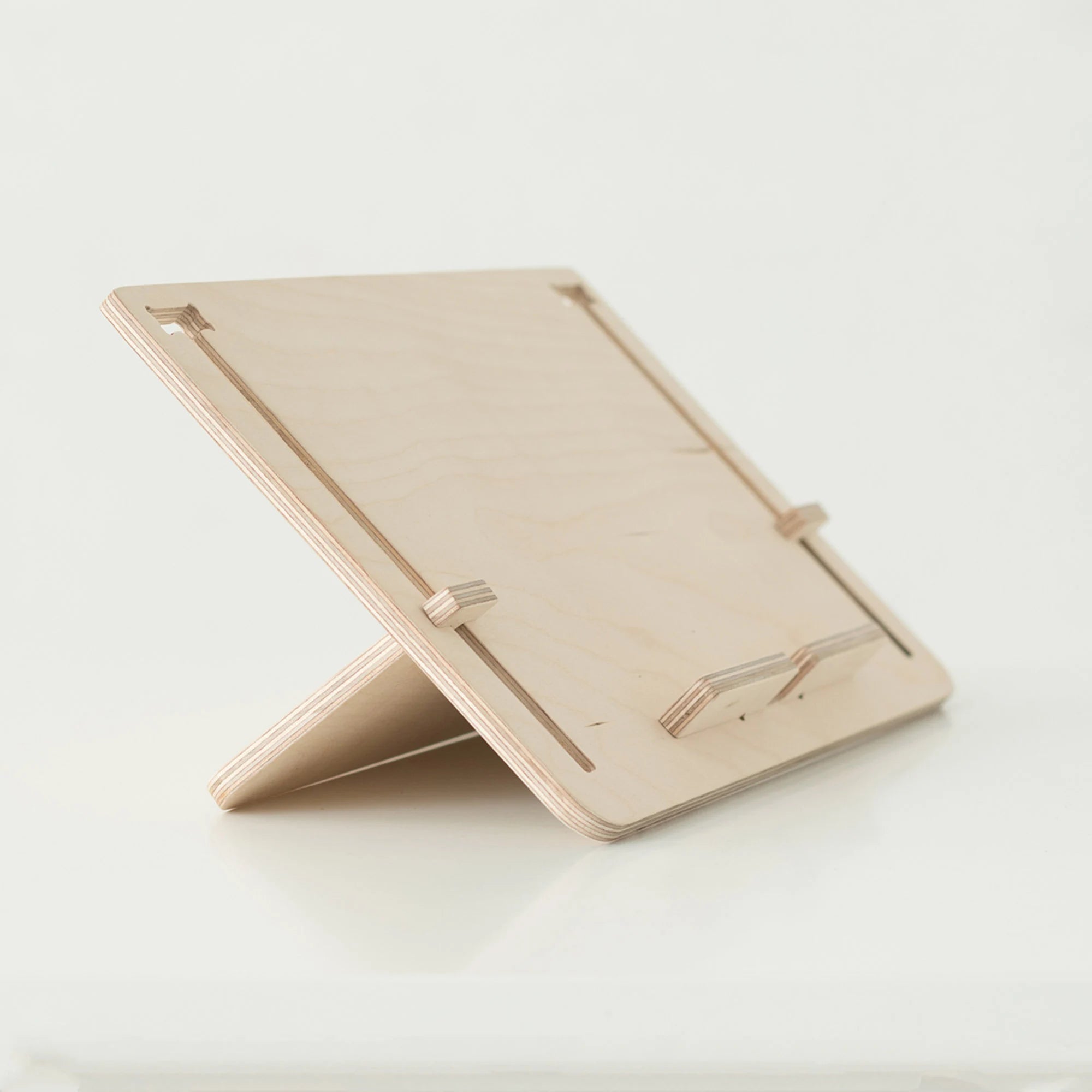 Versatile Adjustable Stand for Tablets, E-Books and Books, Perfect for Working, Playing or Relaxing Anywhere.Detablet