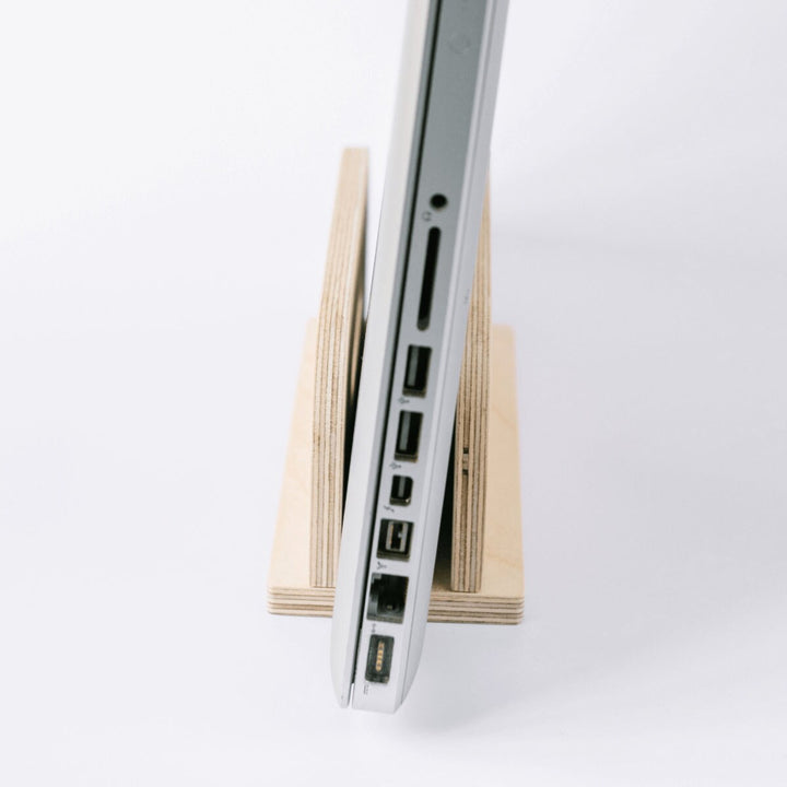 Vertical Stand for Laptops, Charging Included. Organize and Charge Your Devices with Convenience and Efficiency. DEREST